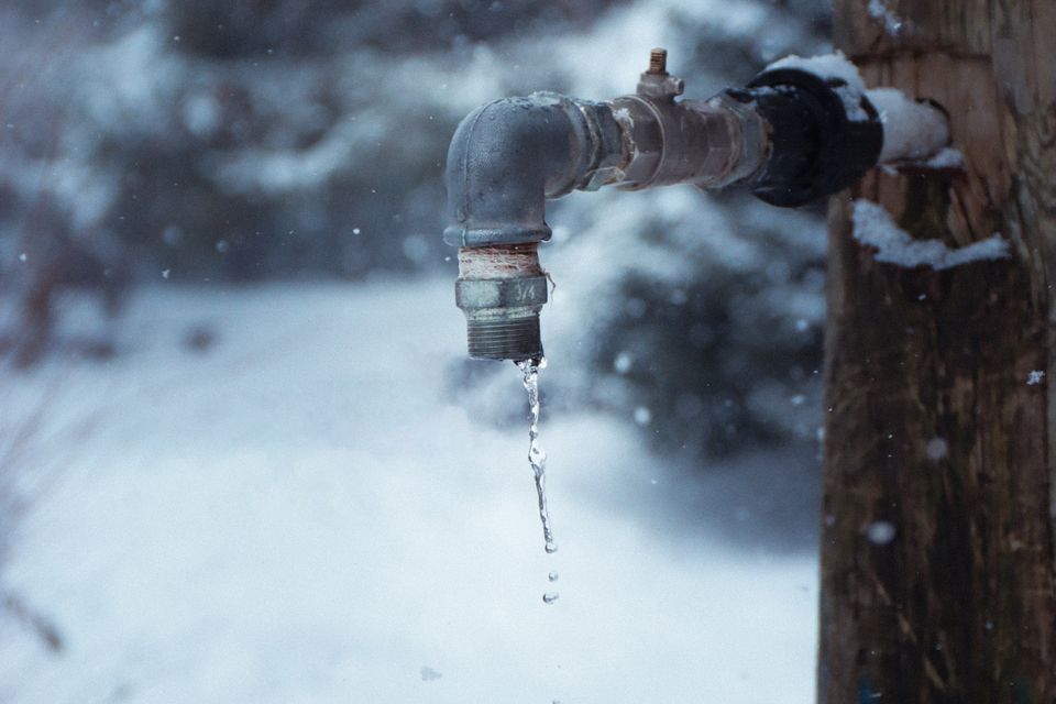 Outdoor faucet covered in ice